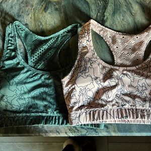 2 good condition Zyia bomber bras